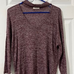 This is a ginger g shirt that is a medium and is purple